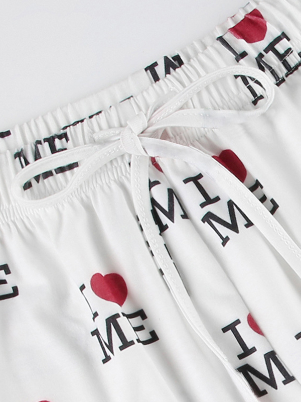Pantalones rectos con estampado de letras de corazón-3